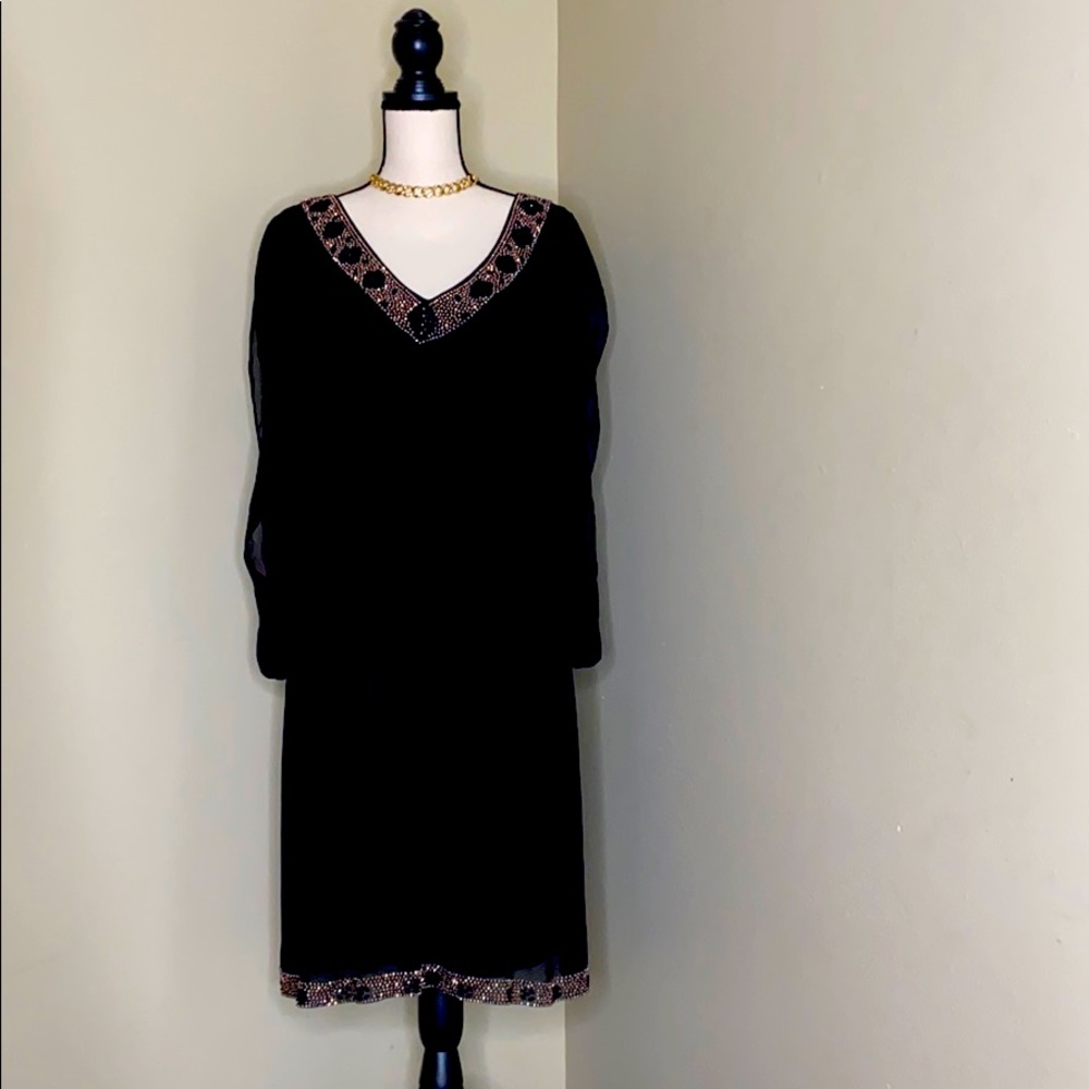 Black chic dress with sequin neckline